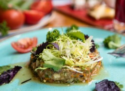 green vegetable on white ceramic plate