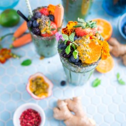 tilt shift lens photography of fruits in drinking glass